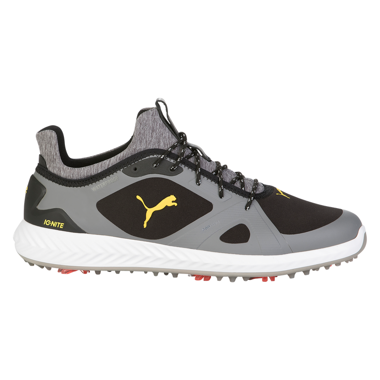 black and yellow golf shoes